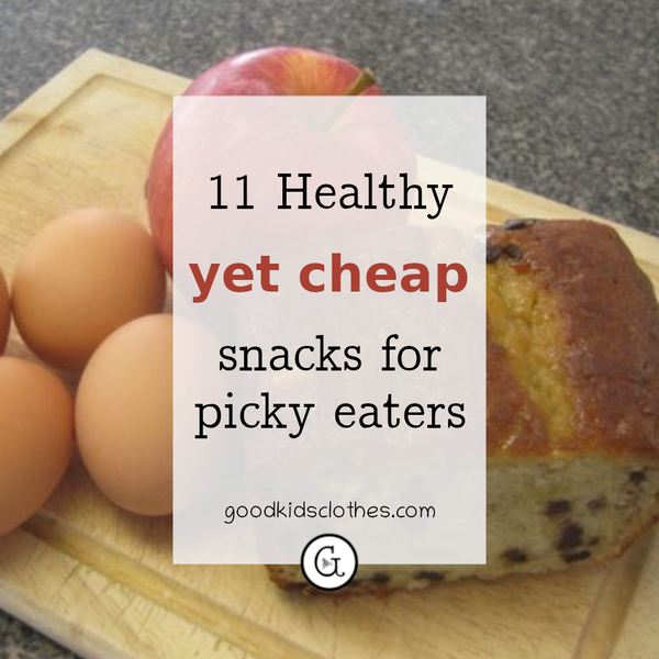 eggs, fruit, and banana bread on a cutting board in kitchen