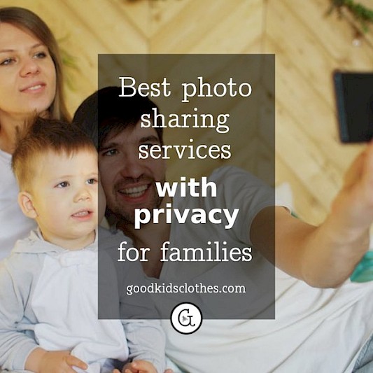 father taking photo of wife and toddler